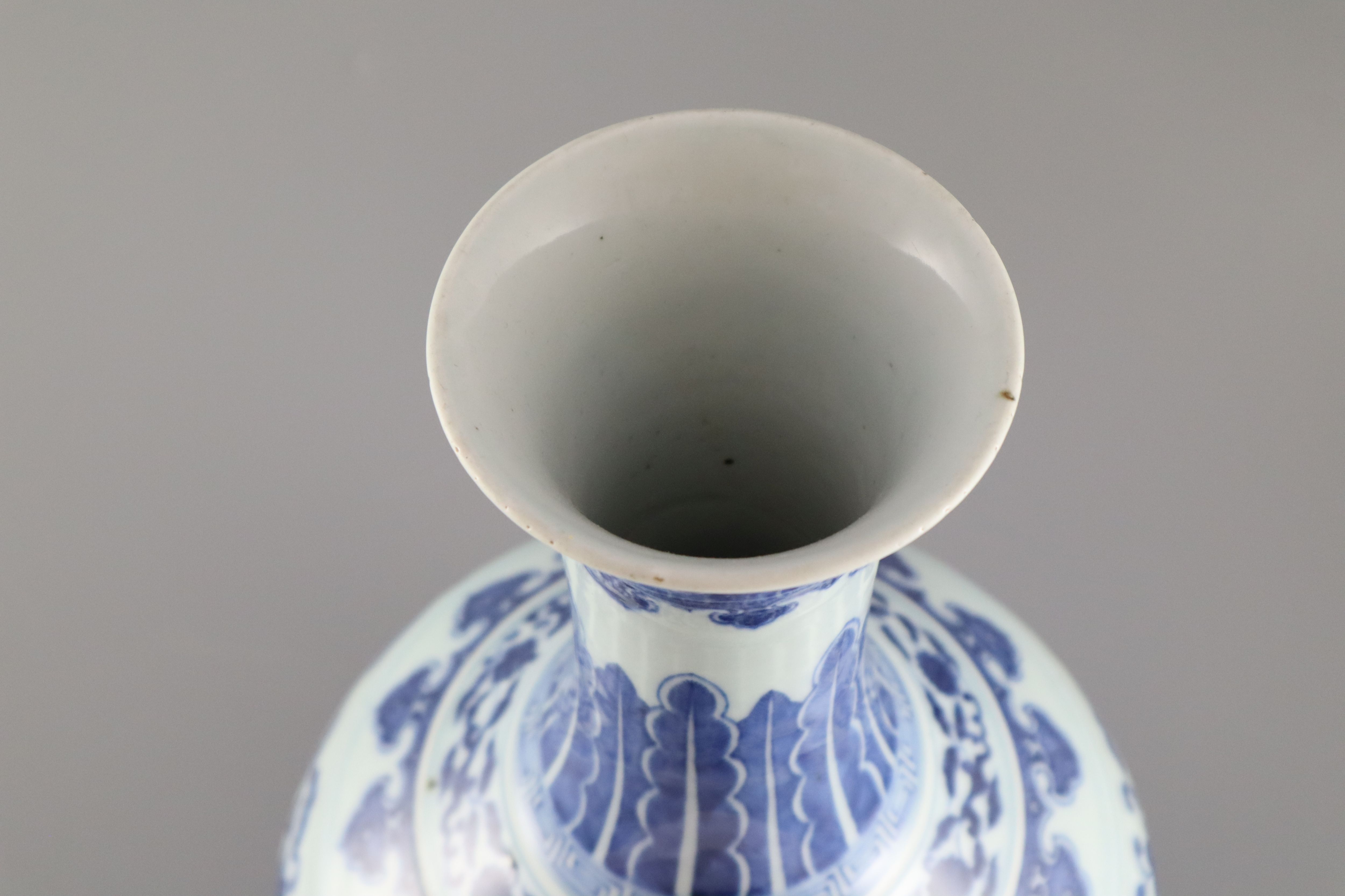 A Chinese blue and white Ming style bottle vase, Qianlong six character mark but later, 41.5cm high